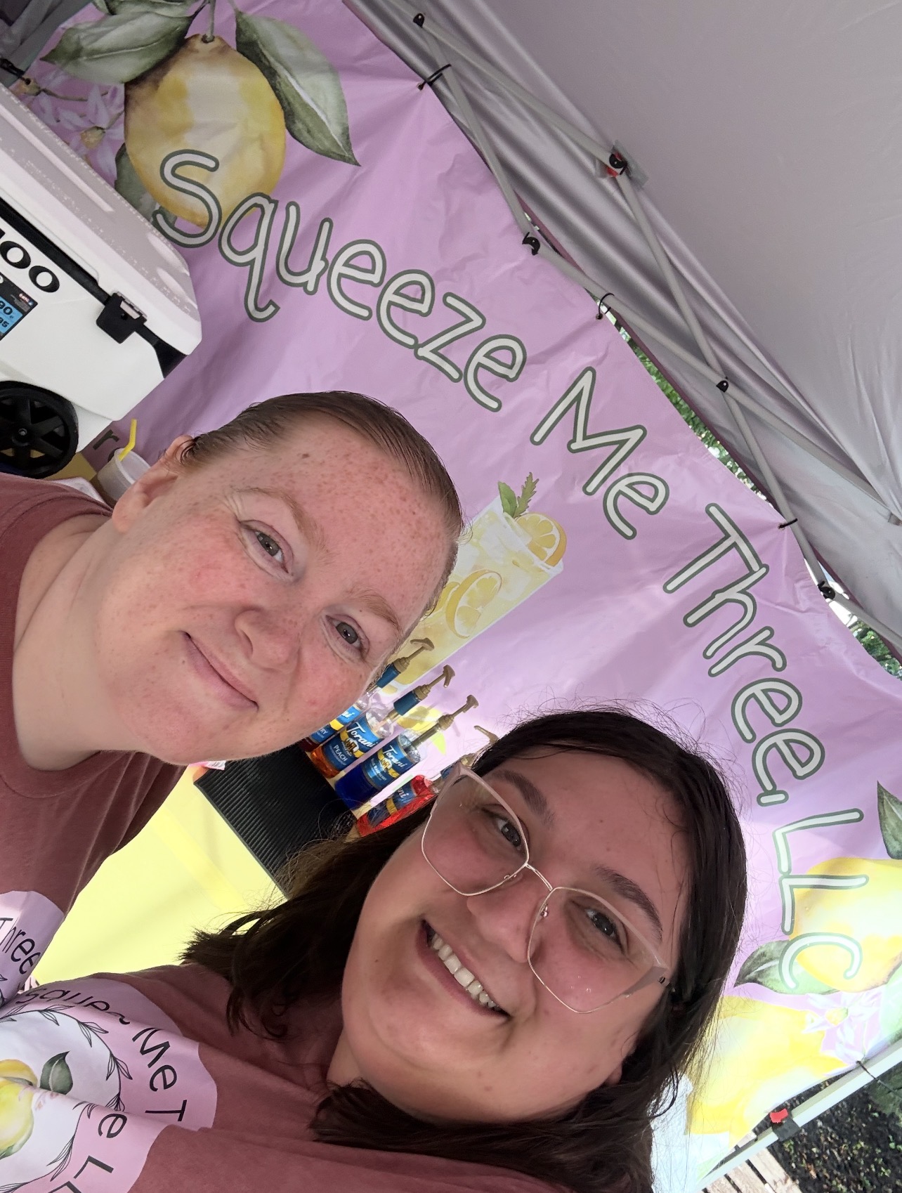 The Squeeze Me Three family at their event booth
