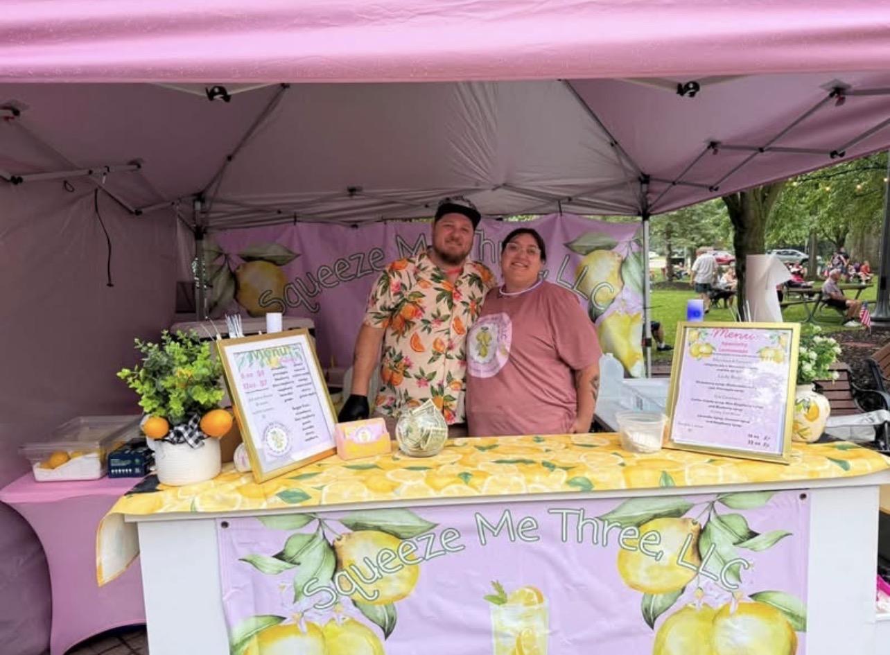 Squeeze Me Three lemonade tent with the family